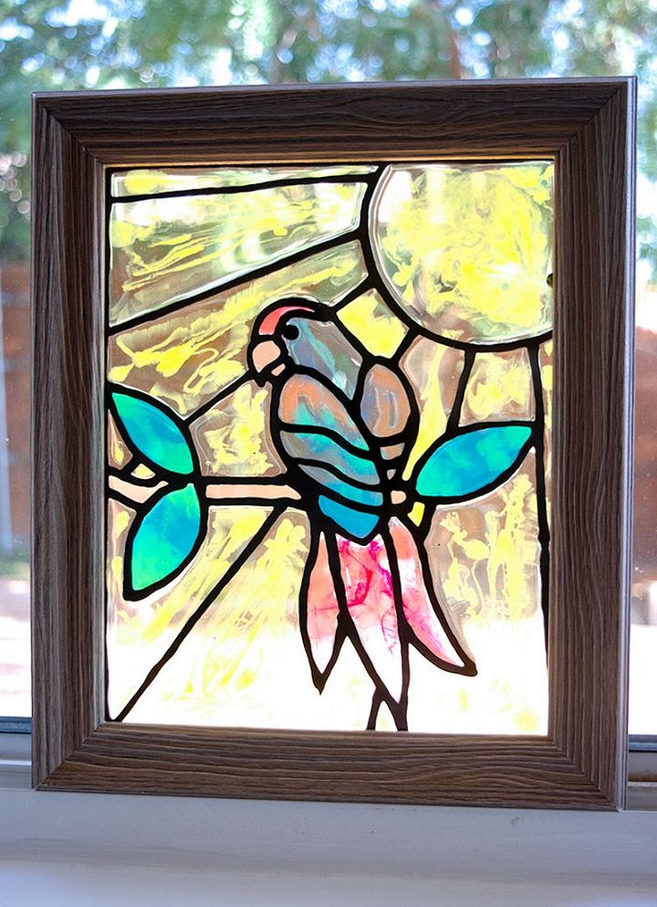 Genius! DIY Faux Stained Glass  Faux stained glass, Stained glass paint,  Diy stained glass window