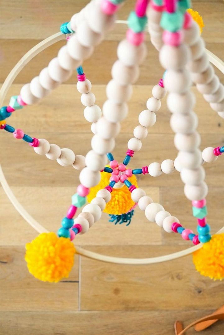 DIY Wood Bead Pom Pom Chandelier