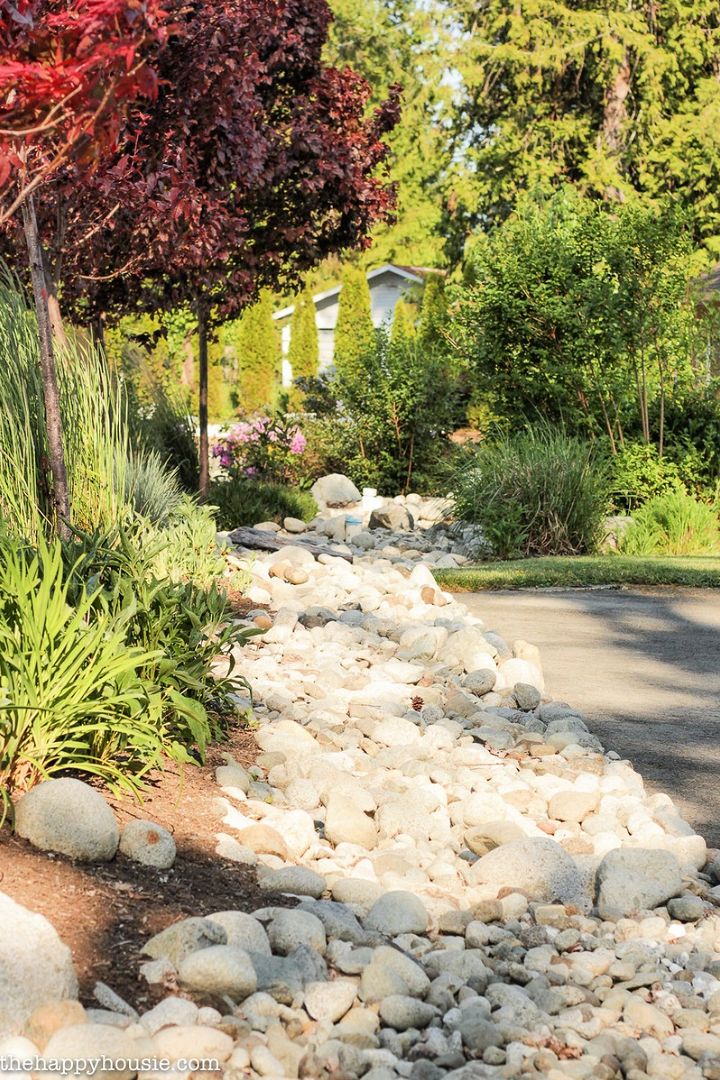Landscaping with River Rock Dry River Rock Garden Ideas