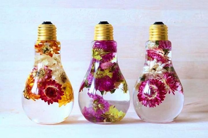 Enchanting Flowers Suspended in Light Bulbs Glisten Like Precious Jewels