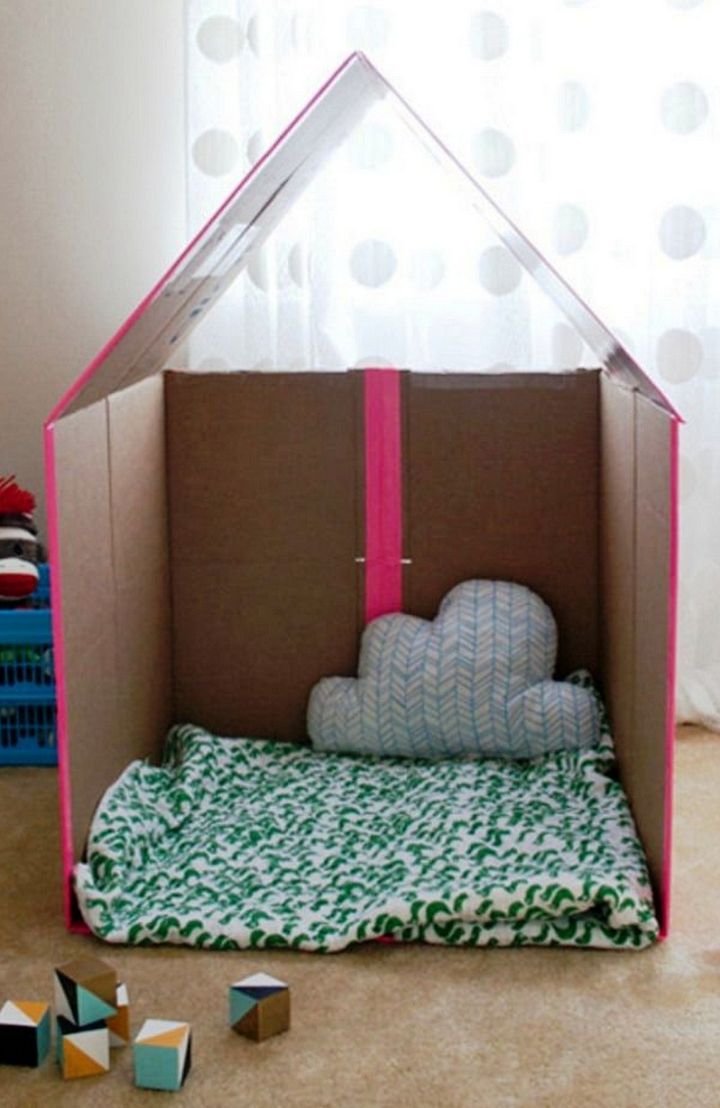 Turn a Plain Cardboard Box Into a Super Cool Playhouse With this Easy DIY