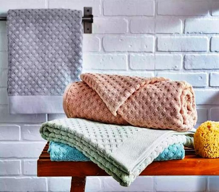 4 Towel Folding Techniques to Make Your Bathroom Feel Luxurious